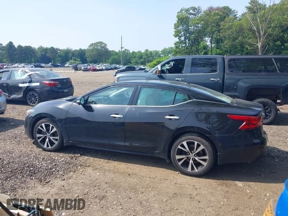 ✅ 2017 Nissan Maxima Platinum • VIN: 1N4AA6AP3HC457482 • Lot: 42568745. Listed on IAAI with 98,971 mi. Free auction sales archive from the USA and detailed vehicle history report at DreamBid. Image 14.