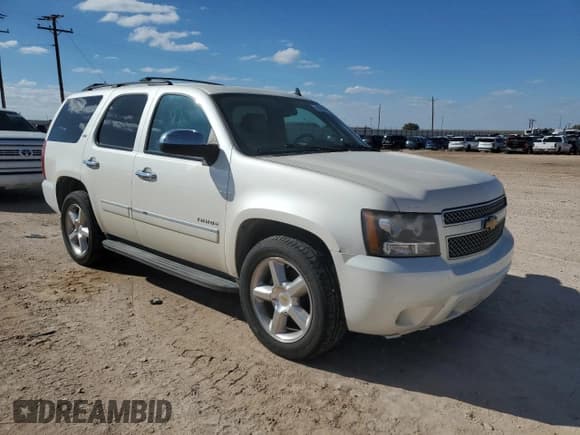 ✅ 2013 Chevrolet Tahoe LTZ • VIN: 1GNSCCE01DR332192 • Lot: 86290515. Listed on Copart with 174,232 mi. Free auction sales archive from the USA and detailed vehicle history report at DreamBid. Image 4.