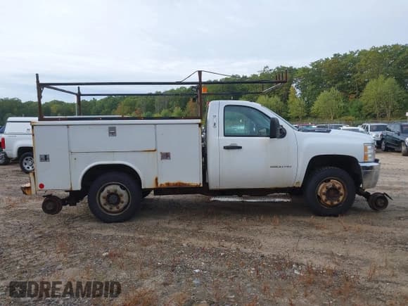 ✅ 2012 Chevrolet Silverado 2500HD Work Truck • VIN: 1GB0KVCG7CZ160946 • Лот: 43201905. Опубликован ранее на IAAI с пробегом 284 358 миль. Бесплатный доступ к архиву аукционных продаж из США и подробный отчёт об истории автомобиля на DreamBid. Изображение 13.