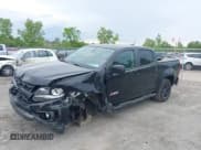 ✅ 2021 Chevrolet Colorado 4WD Z71 • VIN: 1GCGTDENXM1105680 • Lot: 42341543. Listed on IAAI with 85,311 mi. Free auction sales archive from the USA and detailed vehicle history report at DreamBid. Image 17.