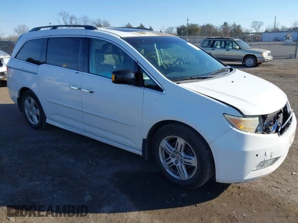 ✅ 2011 Honda Odyssey Touring • VIN: 5FNRL5H93BB053052 • Lot: 43788957. Listed on IAAI with 178,627 mi. Free auction sales archive from the USA and detailed vehicle history report at DreamBid. Image 1.