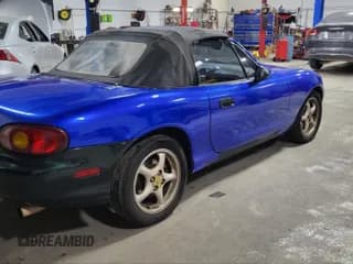 ✅ 1999 Mazda MX-5 Miata • VIN: JM1NB3536X0121095 • Lot: 42138447. Wystawiony na IAAI z przebiegiem 146 636 mil. Bezpłatny archiwum sprzedaży aukcyjnych z USA i szczegółowy raport historii pojazdu na DreamBid. Zdjęcie 4.