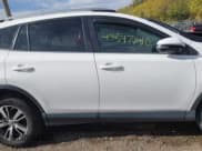 ✅ 2018 Toyota RAV4 XLE • VIN: JTMWFREVXJJ168015 • Lot: 43547840. Listed on IAAI with 104,838 mi. Free auction sales archive from the USA and detailed vehicle history report at DreamBid. Image 13.