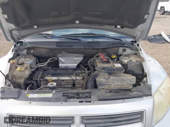 2012 Dodge Caliber SE z VIN 1C3CDWBA8CD529787, wystawiony jako IAAI lot #42427087 z przebiegiem 137 572 mil mil oraz . Historia ofert i sprzedaży dostępna na DreamBid. Obrazek 10.