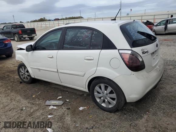 ✅ 2010 Kia Rio LX • VIN: KNADH5A39A6647878 • Lot: 47428315. Listed on Copart with 221,826 mi. Free auction sales archive from the USA and detailed vehicle history report at DreamBid. Image 2.