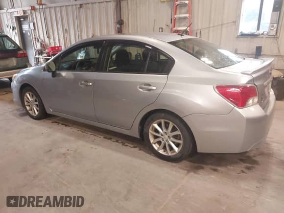 2013 Subaru Impreza Premium with VIN JF1GJAC67DH012385, listed as a IAAI auction lot 43053735 with 130,902 mi miles and . Bid and sale history available at DreamBid. Image 3.