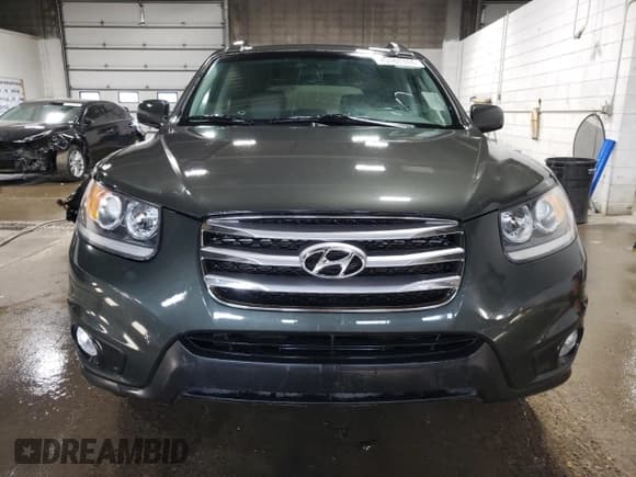 ✅ 2012 Hyundai Santa Fe SE • VIN: 5XYZH4AG3CG117525 • Lot: 75181374. Listed on Copart with 96,764 mi. Free auction sales archive from the USA and detailed vehicle history report at DreamBid. Image 5.