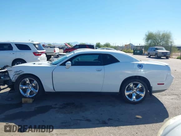 2011 Dodge Challenger R/T z VIN 2B3CJ5DT0BH565702, wystawiony jako IAAI lot #43528357 z przebiegiem 120 653 mil mil oraz . Historia ofert i sprzedaży dostępna na DreamBid. Obrazek 14.