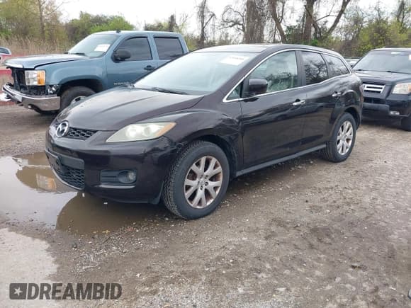 ✅ 2007 Mazda CX-7 Grand Touring • VIN: JM3ER29L870122594 • Lot: 42048506. Listed on IAAI with 119,207 mi. Free auction sales archive from the USA and detailed vehicle history report at DreamBid. Image 2.