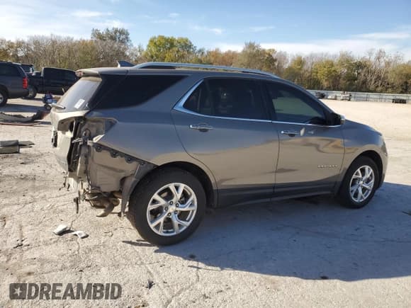 ✅ 2018 Chevrolet Equinox Premier • VIN: 3GNAXVEV8JS612806 • Лот: 91806335. Опубликован ранее на Copart с пробегом 72 483 миль. Бесплатный доступ к архиву аукционных продаж из США и подробный отчёт об истории автомобиля на DreamBid. Изображение 3.