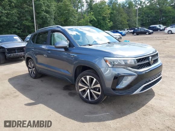 ✅ 2022 Volkswagen Taos SE • VIN: 3VVLX7B28NM096269 • Лот: 43064167. Опубликован ранее на IAAI с пробегом 58 515 миль. Бесплатный доступ к архиву аукционных продаж из США и подробный отчёт об истории автомобиля на DreamBid. Изображение 1.