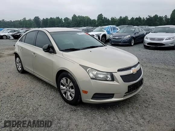 ✅ 2012 Chevrolet Cruze LS • VIN: 1G1PC5SH4C7115047 • Lot: 67647225. Listed on Copart with 132,126 mi. Free auction sales archive from the USA and detailed vehicle history report at DreamBid. Image 13.