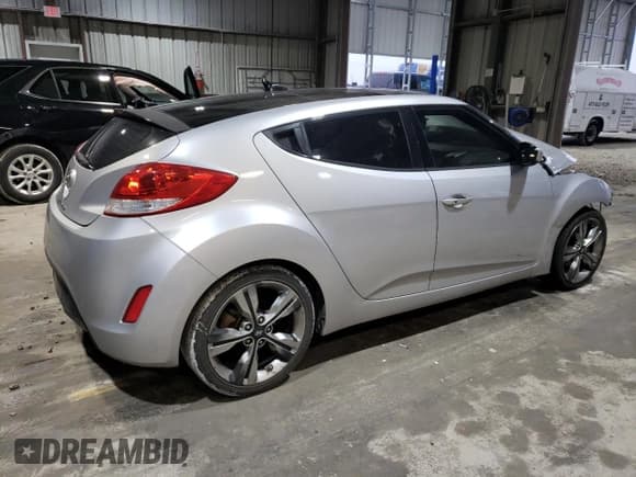 ✅ 2017 Hyundai Veloster • VIN: KMHTC6AD0HU316295 • Lot: 86703034. Wystawiony na Copart z przebiegiem 148 291 mil. Bezpłatny archiwum sprzedaży aukcyjnych z USA i szczegółowy raport historii pojazdu na DreamBid. Zdjęcie 3.