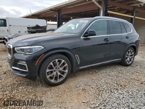 ✅ 2021 BMW X5 xDrive45e • VIN: 5UXTA6C04M9H58063 • Lot: 53128655. Listed on Copart with 56,558 mi. Free auction sales archive from the USA and detailed vehicle history report at DreamBid. Image 1.