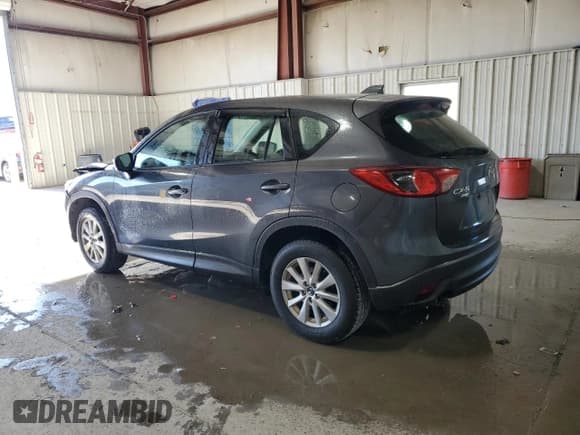 ✅ 2015 Mazda CX-5 Sport • VIN: JM3KE4BY9F0481211 • Лот: 86256445. Опубликован ранее на Copart с пробегом Не указан. Бесплатный доступ к архиву аукционных продаж из США и подробный отчёт об истории автомобиля на DreamBid. Изображение 2.