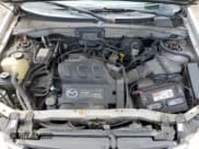 ✅ 2001 Mazda Tribute LX • VIN: 4F2CU08171KM08452 • Lot: 65831605. Listed on Copart with 208,337 mi. Free auction sales archive from the USA and detailed vehicle history report at DreamBid. Image 12.