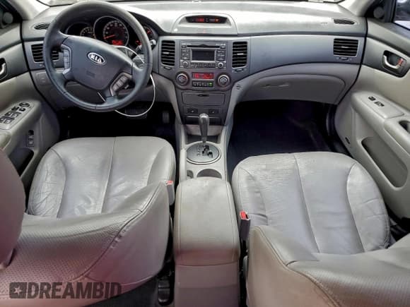 ✅ 2009 Kia Optima SX • VIN: KNAGE224295289214 • Lot: 93855725. Wystawiony na Copart z przebiegiem 156 840 mil. Bezpłatny archiwum sprzedaży aukcyjnych z USA i szczegółowy raport historii pojazdu na DreamBid. Zdjęcie 8.