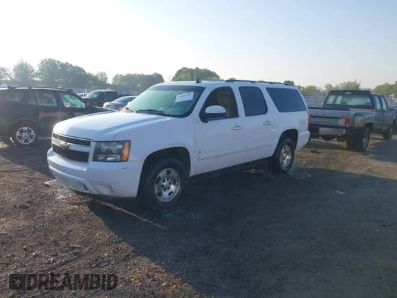 ✅ 2007 Chevrolet Suburban LTZ • VIN: 3GNFC16087G271075 • Lot: 42010391. Listed on IAAI with 217,223 mi. Free auction sales archive from the USA and detailed vehicle history report at DreamBid. Image 2.
