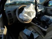 ✅ 2007 Mercury Mariner Luxury • VIN: 4M2CU91157KJ12444 • Lot: 93310955. Listed on Copart with 176,307 mi. Free auction sales archive from the USA and detailed vehicle history report at DreamBid. Image 8.