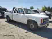 1990 Dodge Dakota with VIN 1B7GL23XXLS708226, listed as a Copart auction lot 69859125 with 372,216 mi miles and Salvage title. Bid and sale history available at DreamBid. Image 4.
