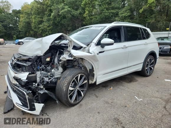 ✅ 2023 Volkswagen Tiguan SEL R-Line • VIN: 3VV4B7AXXPM029983 • Лот: 84759205. Опубликован ранее на Copart с пробегом 23 925 миль. Бесплатный доступ к архиву аукционных продаж из США и подробный отчёт об истории автомобиля на DreamBid. Изображение 1.