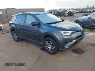 ✅ 2018 Toyota RAV4 LE • VIN: JTMBFREV1JJ734089 • Lot: 43487260. Listed on IAAI with 152,568 mi. Free auction sales archive from the USA and detailed vehicle history report at DreamBid. Image 1.