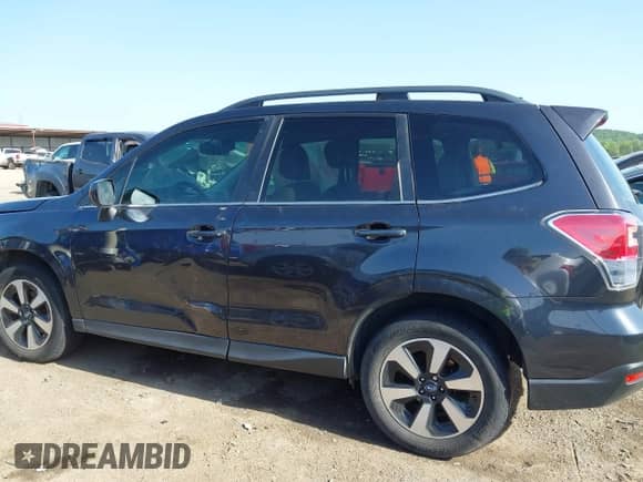 2017 Subaru Forester Limited with VIN JF2SJALC1HH513550, listed as a IAAI auction lot 42266191 with 98,351 mi miles and . Bid and sale history available at DreamBid. Image 14.