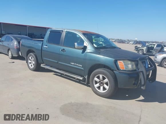 ✅ 2005 Nissan Titan XE • VIN: 1N6BA07AX5N563374 • Lot: 43627413. Listed on IAAI with 151,817 mi. Free auction sales archive from the USA and detailed vehicle history report at DreamBid. Image 1.
