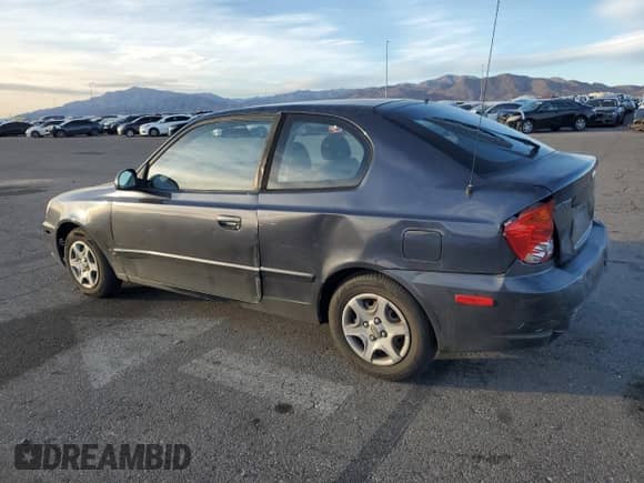 2005 Hyundai Accent GLS с VIN KMHCG35C65U359247, выставлен на аукционе Copart как лот 79305324 с пробегом 120 985 миль миль и Списание • Salvage title. История ставок и продаж доступна на DreamBid. Изображение 2.