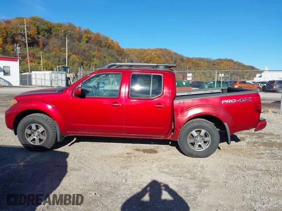 2012 Nissan Frontier SL z VIN 1N6AD0EV3CC445474, wystawiony jako IAAI lot #43616070 z przebiegiem 226 537 mil mil oraz . Historia ofert i sprzedaży dostępna na DreamBid. Obrazek 14.