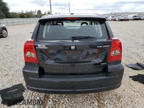 ✅ 2009 Dodge Caliber SXT • VIN: 1B3HB48A99D183634 • Lot: 80127034. Wystawiony na Copart z przebiegiem 34 404 mil. Bezpłatny archiwum sprzedaży aukcyjnych z USA i szczegółowy raport historii pojazdu na DreamBid. Zdjęcie 6.