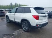 ✅ 2023 Honda Passport EX-L • VIN: 5FNYF8H5XPB005136 • Lot: 42275156. Listed on IAAI with 35,471 mi. Free auction sales archive from the USA and detailed vehicle history report at DreamBid. Image 3.