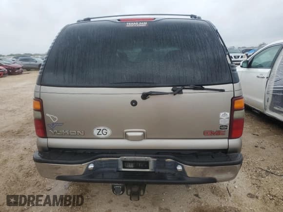 ✅ 2001 GMC Yukon SLT • VIN: 1GKEK13V01R208734 • Лот: 59297534. Опубликован ранее на Copart с пробегом 216 936 миль. Бесплатный доступ к архиву аукционных продаж из США и подробный отчёт об истории автомобиля на DreamBid. Изображение 6.