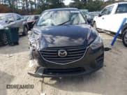 ✅ 2016 Mazda CX-5 Grand Touring • VIN: JM3KE4DY9G0764433 • Lot: 82728825. Wystawiony na Copart z przebiegiem 166 905 mil. Bezpłatny archiwum sprzedaży aukcyjnych z USA i szczegółowy raport historii pojazdu na DreamBid. Zdjęcie 5.