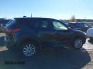 ✅ 2016 Mazda CX-5 Touring • VIN: JM3KE4CY8G0653406 • Lot: 43730001. Listed on IAAI with 79,279 mi. Free auction sales archive from the USA and detailed vehicle history report at DreamBid. Image 13.
