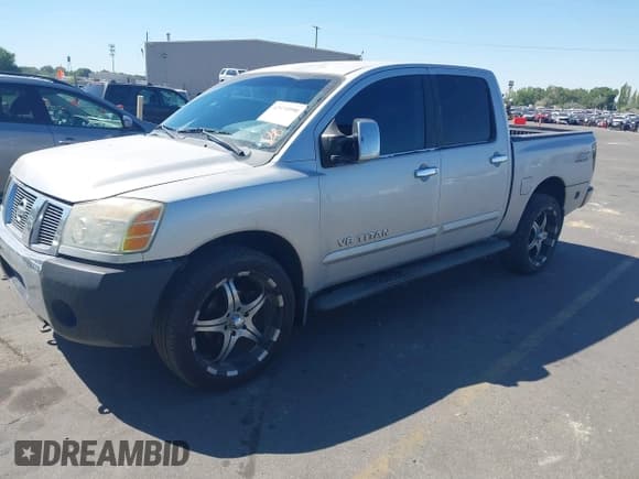✅ 2005 Nissan Titan LE • VIN: 1N6AA07B05N502426 • Lot: 42970990. Listed on IAAI with 193,882 mi. Free auction sales archive from the USA and detailed vehicle history report at DreamBid. Image 2.