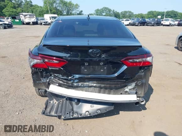 2023 Toyota Camry SE with VIN 4T1G11BKXPU097643, listed as a IAAI auction lot 42833306 with 23,580 mi miles and . Bid and sale history available at DreamBid. Image 16.