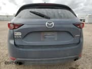 ✅ 2021 Mazda CX-5 Carbon Edition • VIN: JM3KFACM4M0473022 • Lot: 46983515. Wystawiony na Copart z przebiegiem Nie podano. Bezpłatny archiwum sprzedaży aukcyjnych z USA i szczegółowy raport historii pojazdu na DreamBid. Zdjęcie 6.