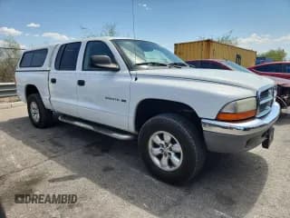 ✅ 2002 Dodge Dakota SLT • VIN: 1B7HG48N62S660900 • Lot: 59916375. Wystawiony na Copart z przebiegiem 209 325 mil. Bezpłatny archiwum sprzedaży aukcyjnych z USA i szczegółowy raport historii pojazdu na DreamBid. Zdjęcie 4.