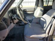 ✅ 1997 Jeep Cherokee Country • VIN: 1J4FJ78S1VL603836 • Lot: 93272635. Listed on Copart with 170,878 mi. Free auction sales archive from the USA and detailed vehicle history report at DreamBid. Image 7.