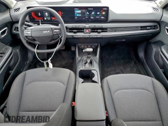 ✅ 2025 Kia K4 LXS • VIN: 3KPFT4DE4SE072067 • Лот: 92823495. Опубликован ранее на Copart с пробегом 16 807 миль. Бесплатный доступ к архиву аукционных продаж из США и подробный отчёт об истории автомобиля на DreamBid. Изображение 8.