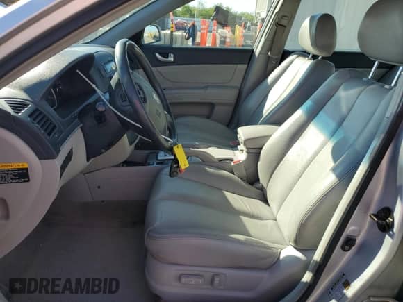 2006 Hyundai Sonata GLS with VIN 5NPEU46F26H044252, listed as a Copart auction lot 82528835 with 92,210 mi miles and Salvage title. Bid and sale history available at DreamBid. Image 7.