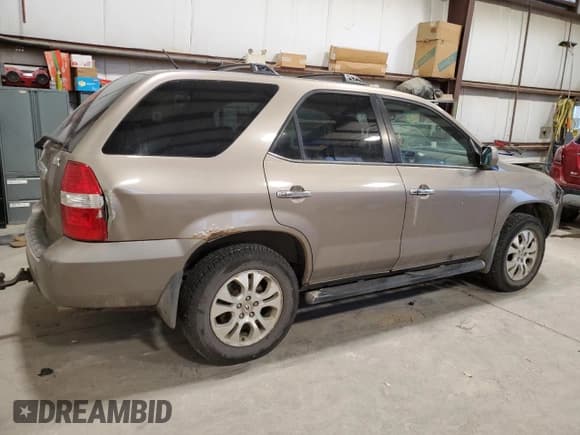 ✅ 2003 Acura MDX Touring • VIN: 2HNYD186X3H001172 • Лот: 75758224. Опубликован ранее на Copart с пробегом 316 579 миль. Бесплатный доступ к архиву аукционных продаж из США и подробный отчёт об истории автомобиля на DreamBid. Изображение 3.