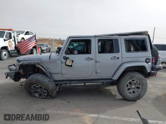 ✅ 2017 Jeep Wrangler Unlimited Rubicon • VIN: 1C4BJWFGXHL701569 • Lot: 41567344. Wystawiony na IAAI z przebiegiem 57 754 mil. Bezpłatny archiwum sprzedaży aukcyjnych z USA i szczegółowy raport historii pojazdu na DreamBid. Zdjęcie 14.