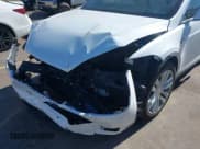 ✅ 2016 Tesla Model X P90D • VIN: 5YJXCAE40GF014533 • Lot: 42127096. Wystawiony na IAAI z przebiegiem 77 281 mil. Bezpłatny archiwum sprzedaży aukcyjnych z USA i szczegółowy raport historii pojazdu na DreamBid. Zdjęcie 6.