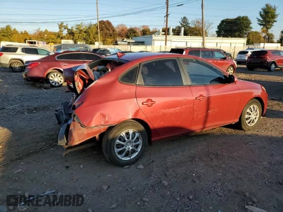 2010 Hyundai Elantra GLS z VIN KMHDU4ADXAU156633, wystawiony jako Copart lot #77080374 z przebiegiem 187 320 mil mil oraz Szkoda całkowita • Salvage title. Historia ofert i sprzedaży dostępna na DreamBid. Obrazek 3.