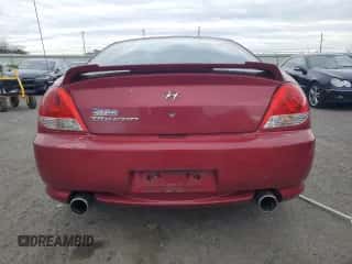 ✅ 2006 Hyundai Tiburon GS • VIN: KMHHM65D86U203902 • Лот: 85872545. Опубликован ранее на Copart с пробегом 102 778 миль. Бесплатный доступ к архиву аукционных продаж из США и подробный отчёт об истории автомобиля на DreamBid. Изображение 6.