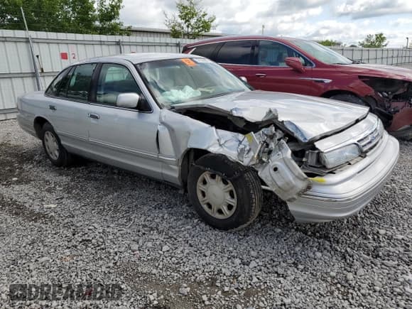 ✅ 1997 Ford Crown Victoria • VIN: 2FALP73W2VX179173 • Lot: 57828405. Listed on Copart with 251,598 mi. Free auction sales archive from the USA and detailed vehicle history report at DreamBid. Image 4.