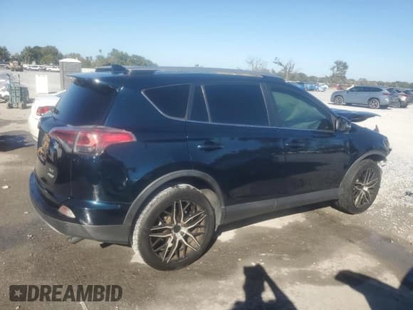 ✅ 2018 Toyota RAV4 XLE • VIN: JTMWFREV3JD128325 • Lot: 92723055. Listed on Copart with 124,335 mi. Free auction sales archive from the USA and detailed vehicle history report at DreamBid. Image 3.