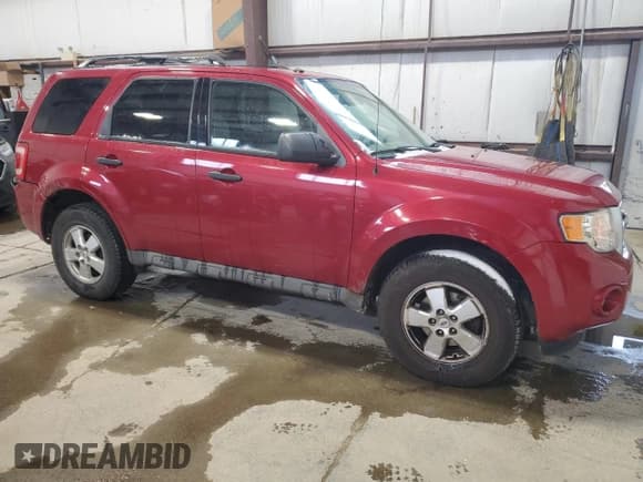 ✅ 2009 Ford Escape XLT • VIN: 1FMCU93G59KC13635 • Lot: 86461745. Listed on Copart with 232,865 mi. Free auction sales archive from the USA and detailed vehicle history report at DreamBid. Image 4.
